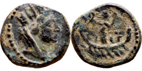 Hellenistic period coin (4-1 century BC) bronze. Obv: Bust of Tyche. Rev: Victoria holding two wreaths, sailing on a galley.

16mm 0.98g
