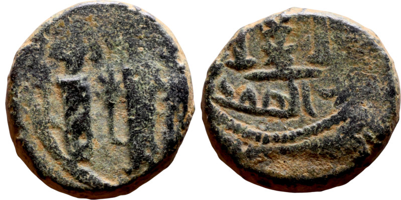 Seljuk (1037–1157, Bronze coin. Obverse: Arabic inscription. Reverse: Arabicc in...