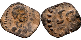 An imitation of a coin minted in Antioch (1st–3rd century).

15mm 0.32g

Artificial sand patina