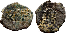 Seljuk (1037–1157, Bronze coin. Obverse: Arabic inscription. Reverse: Arabicc inscription

14mm 0.50g