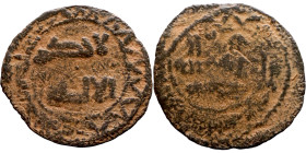 Umayyad/Abbasid. Bronze coin. Obverse: Arabic inscription. Reverse: Arabic inscription

22mm 1.66g

Artificial sand patina