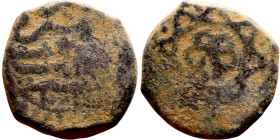 Umayyad/Abbasid. Bronze coin. Obverse: Arabic inscription. Reverse: Arabic inscription

15mm 2.66g