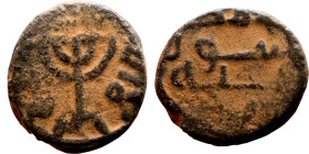 Umayyad/Abbasid. Bronze coin. Obverse: Arabic inscription. Reverse: Arabic inscription

15mm 2.82g

Artificial sand patina