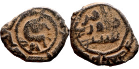 Umayyad/Abbasid. Bronze coin. Obverse: Arabic inscription. Reverse: Arabic inscription

17mm 1.89g

Artificial sand patina