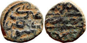 Seljuk (1037–1157, bronze coin in roman style. Obverse: Bust. Reverse: Arabicc inscription

12mm 1.10g