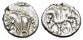 Central Gaul. Bituriges Cubi. c, 75-50 BC. AR Quinarius (14mm, 1.96g, 12h). Male head l. with hair in three large locks. R/ Horse advancing l., branch...