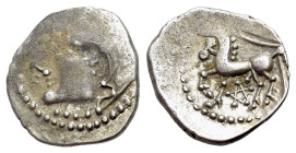 Central Gaul, Bituriges Cubi, c. 1st century BC. AR Quinarius (15mm, 1.90g, 1h). Bare male head l. R/ Horse prancing l.; sword above; pentagram below....