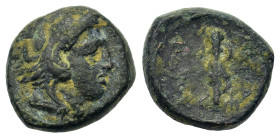 Kings of Macedon. Alexander III 'the Great' (336-323 BC). Æ (14,2mm, 4.04g). Amphipolis mint, c. 336-332. Head of Herakles in lion's skin headdress to...