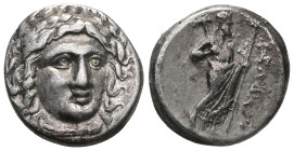 Greek Coins
SATRAPS of CARIA.Maussolos.(Circa 377-353 BC).Halikarnassos.Drachm.
Obv : Laureate head of Apollo facing slightly right.
Rev : MAYΣΣΩΛΛON....