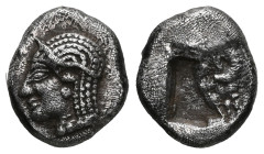 Greek
Ionia, Kolophon. AR Obol. Late 6th century BC.
Obv.: Archaic male head (of Apollo?) left.
Rev.: Quadripartite incuse square.
Ref.: SNG Kayhan 34...