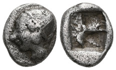 Greek
Ionia, Kolophon. AR Obol. Late 6th century BC.
Obv.: Archaic male head (of Apollo?) left.
Rev.: Quadripartite incuse square.
Ref.: SNG Kayhan 34...