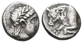 Greek , Ionia, Magnesia ad Maeandrum. AR Obol , c. 4th-3rd century BC.
Laureate head of Apollo right.
Rev. Forepart of bull right;
Klein 408; SNG Tübi...