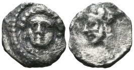 Greek Coins , Obol , bust of female facing, rev bust of Herakles, lion’s skin around neck (SNG Lev 220-221; Traité 601, Nagidus). Both heads weakly st...