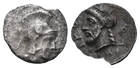 Greek Coins
CILICIA. Holmoi. Obol (Circa 4th century BC).
Obv: Head of Athena left, wearing Attic helmet.
Rev: OΛMITIKON.
Bearded head left.
SNG Levan...