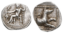 GREEK COINS
LYCAONIA.Laranda.(Circa 324-323 BC).Obol.
Obv : Baaltars seated left, holding grain ear, bunch of grapes, and scepter.
Rev : Forepart of w...