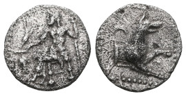 GREEK COINS
LYCAONIA.Laranda.(Circa 324-323 BC).Obol.
Obv : Baaltars seated left, holding grain ear, bunch of grapes, and scepter.
Rev : Forepart of w...