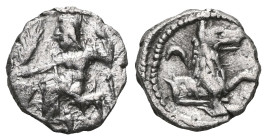 GREEK COINS
LYCAONIA.Laranda.(Circa 324-323 BC).Obol.
Obv : Baaltars seated left, holding grain ear, bunch of grapes, and scepter.
Rev : Forepart of w...