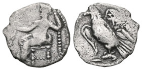 Cilicia, uncertain mint. AR Obol.
Cilicia, uncertain mint. AR Obol. 4th C. Baaltars seated l., holding grain ear, grape-bunch and sceptre / Eagle stan...