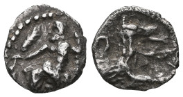 GREEK COINS
LYCAONIA.Laranda.(Circa 324-323 BC).Obol.
Obv : Baaltars seated left, holding grain ear, bunch of grapes, and scepter.
Rev : Forepart of w...