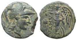 Pamphylia. Side.
Bronze. 2nd century BC
Obverse: Head of Athena with Corinthian helmet to the right.
Reverse: Nike standing to the left with palm bran...