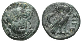 GREEK COINS
Troas
Sigeion. Aes c. 350. Head of Athena wearing triple-crested helmet facing and turned slightly to r. Rev. SIGE Owl standing to r., hea...