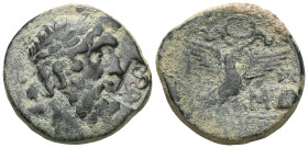 Greek
PHRYGIA, GALATIA OR CILICIA. Uncertain. 1st century BC. AE (Bronze). Laureate head of Zeus to right. Rev. Eagle with spread wings alighting left...