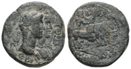 Roman Provincial , Claudius and Agrippina II (?). Obv: laureate portrait of Claudius (?) and draped bust of Agrippina II (?), jugate, right. Rev :Plut...