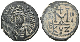 Byzantine
Maurice Tiberius, 582-602. Follis , Cyzicus. Helmeted and cuirassed bust facing, holding globus cruciger and shield decorated. Rev. Large M;...