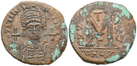 Byzantine coins
Justinian I (527-565) AE Follis (Bronze) Antioch, year 20 = 546/547.
Obv: DN IVSTINIANVS PP AVG, helmeted and cuirassed bust facing, h...