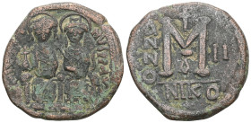 Byzantine
Justin II, with Sophia, 565-578. Follis (Bronze), Nicomedia, 566/7. D N IVSTINVS P P AVG Justin, holding globus cruciger in his right hand, ...