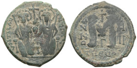 Byzantine
 Justin II and Sophia, AE, Follis. (Bronze) Theoupolis (Antioch). 565-578 AD.
Obv: Justin II and Sophia nimbate and seated on lyre-backed th...