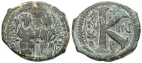 Byzantine
 Justin II and Sophia, AE, Half Follis. (Bronze) Theoupolis (Antioch). 565-578 AD.
Obv: Justin II and Sophia nimbate and seated on lyre-back...