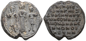 Obv.: Three holy persons nimbate standing facial each on a dais, the Mother of God "Vlachernitissa" in the middle, wearing long chiton and maphorion a...