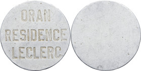 ALGÉRIE - ALGERIA
IIIe République (1870-1940). Jeton d’ascenseur, Résidence Leclerc à Oran ND.
Aluminium - 3,99 g - 31 mm - 12 h
TB.