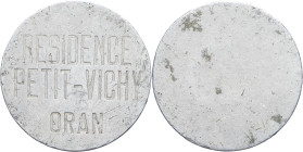 ALGÉRIE - ALGERIA
IIIe République (1870-1940). Jeton d’ascenseur, Résidence Petit-Vichy à Oran ND.
Aluminium - 4,28 g - 31 mm - 12 h
TB.