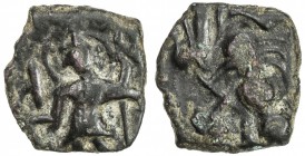 KUSHAN: Anonymous, 3rd century, AE fraction (1.16g), Mitch-—, king standing, nimbated, holding staff and offering sacrifice at altar // Ardoksho, prob...