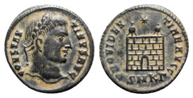 Constantine I (307/310-337). Æ Follis (20mm, 2.42g, 12h). Cyzicus, 324-5. Laureate head r. R/ Camp-gate surmounted by two turrets, star above; SMKΓ. R...