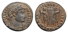 Constantine I (307/310-337). Æ Follis (17mm, 3.08g, 12h). Alexandria, 327-8. Rosette-diademed, draped and cuirassed bust r. R/ Two soldiers flanking t...