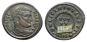 Licinius I (308-324). Æ Follis (20.5mm, 3.11g, 6h). Siscia, 320-1. Laureate head r. R/ VOT XX within wreath; ASIS-star. RIC VII 160. Near EF