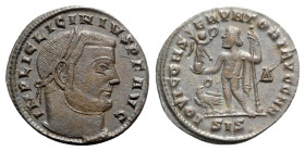 Licinius I (308-324). Æ Follis (22mm, 3.82g, 6h). Siscia, AD 313. Laureate head r. R/ Jupiter standing l., holding globe surmounted by Victory, leanin...