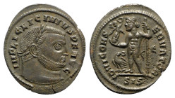 Licinius I (308-324). Æ Follis (23.5mm, 3.49g, 6h). Siscia, 313-5. Laureate head r. R/ Jupiter standing l., holding globe surmounted by Victory, leani...