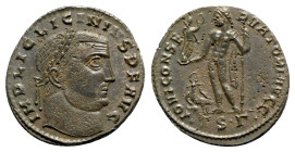 Licinius I (308-324). Æ Follis (23mm, 3.88g, 12h). Thessalonica, 313-6. Laureate head r. R/ Jupiter standing l., holding victory and sceptre; eagle be...