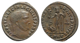 Licinius I (308-324). Æ Follis (24mm, 4.17g, 6h). Heraclea, AD 313. Laureate head r. R/ Jupiter standing front, head l., holding Victory on globe and ...