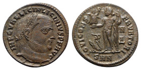 Licinius I (308-324). Æ Follis (22.5mm, 3.88g, 6h). Nicomedia, c. 313-7. Laureate head r. R/ Jupiter standing l., holding Victory on globe and sceptre...