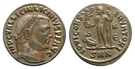 Licinius I (308-324). Æ Follis (22mm, 3.85g, 6h). Nicomedia, c. 313-7. Laureate head r. R/ Jupiter standing l., holding Victory on globe and sceptre; ...