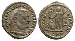 Licinius I (308-324). Æ Follis (24mm, 3.37g, 6h). Nicomedia, c. 313-7. Laureate head r. R/ Jupiter standing l., holding Victory on globe and sceptre; ...
