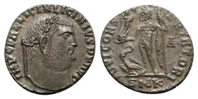 Licinius I (308-324). Æ Follis (20mm, 3.53g, 1h). Cyzicus, 313-5. Laureate head r. R/ Jupiter standing l., holding Victory on globe and sceptre; eagle...