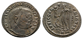 Licinius I (308-324). Æ Follis (24mm, 4.13g, 12h). Cyzicus. Laureate head r. R/ Jupiter standing l., holding victory and sceptre; eagle at feet; I//SK...