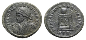 Crispus (Caesar, 323-324). Æ Follis (20mm, 3.05g, 6h). Treveri, 322-3. Laureate and cuirassed bust l., holding spear and shield. R/ Globe set on altar...