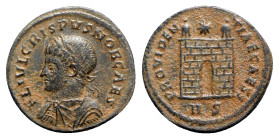 Crispus (Caesar, 316-326). Æ Follis (19mm, 3.38g, 6h). Rome, 324-5. Laureate and cuirassed bust l., holding spear pointed forwards and shield on arm. ...